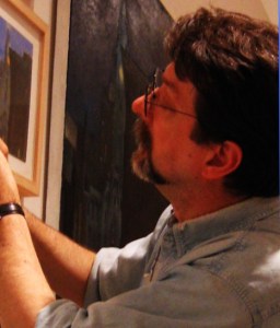 Patrick hanging some of his paintings in an exhibition at the Pennsylvania Academy of Fine Arts.